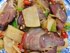 腊肉炒酸萝卜-文杰餐馆(南洪时尚风情街店)