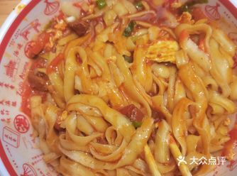 单位门口新开了一家刀削面， 今天试营业还送了冰峰