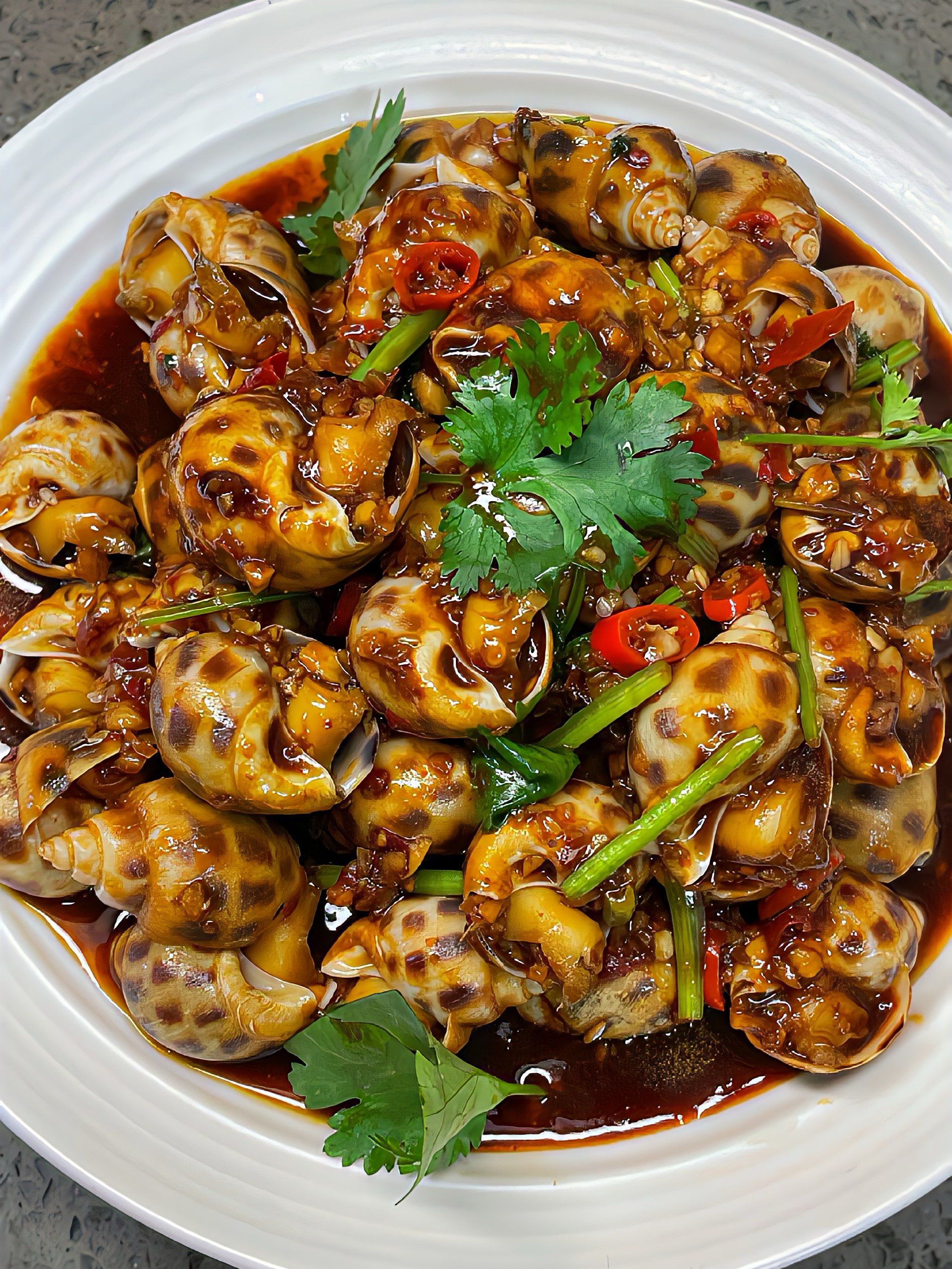 花螺最原汁原味,最能清晰的品尝到花螺本身的鲜美而且做法超级简单,五