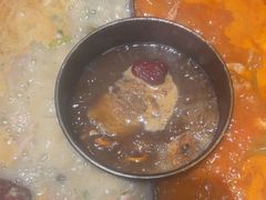 -老牌坊云南鱼豆花火锅(哈西万达店)
