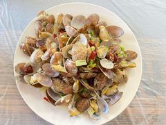 辣炒蛤蜊-1910老鲁味海鲜·戳子肉·青岛菜(金沙滩店)