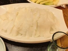 -明何记涮牛肚(品牌首店隋唐植物园南门古城路店)