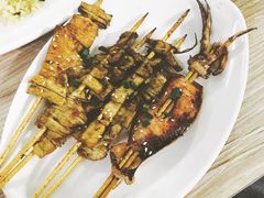 疯狂烤鱿鱼-覃记海鲜美食餐厅