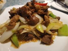 葱爆羊羔肉-巴扎美食·新疆菜·西域歌舞表演餐厅(新疆大厦店)