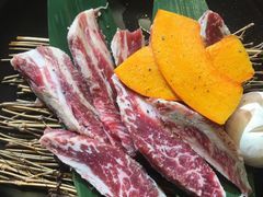 极品浇汁肥牛肋条-草家酱蟹炭火烤肉店(珲春南路一店)