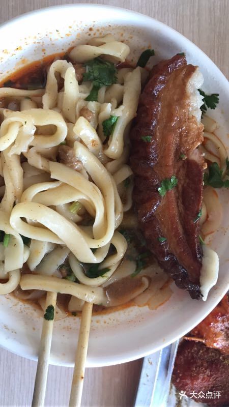 任记七中刀削面图片 - 第1张