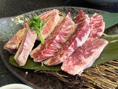 极品浇汁肥牛肋条-草家酱蟹炭火烤肉店(珲春南路一店)