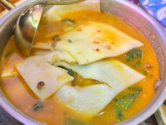 牛牛霸鸡脚煲-浩海火燒雲傣家菜(芮欧百货店)