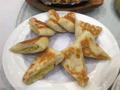 黄米烙-小船渔村•大连菜•大连焖鱼(明泽街店)