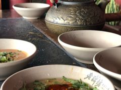 -老牌坊云南鱼豆花火锅(哈西万达店)