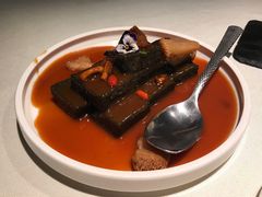 猴头菇鲍汁瑶柱扒制黑豆腐-肴约·花园式餐厅(湖里店)