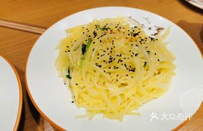 Sour and Spicy Potato Shreds with Pine Nuts