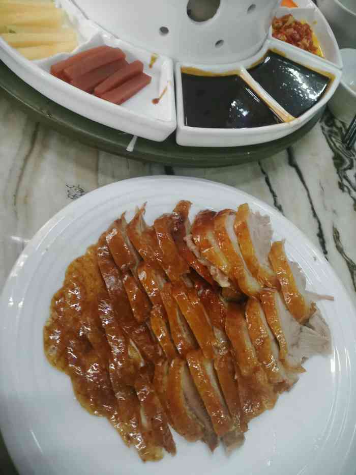 金百万烤鸭店(马甸店)-" 我家离这家店不远,以前也去过几次.