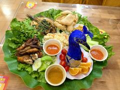 -沐毫傣泐云南菜孔雀宴•手抓饭傣味烧烤(曼听公园店)