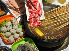 -明何记涮牛肚(品牌首店隋唐植物园南门古城路店)