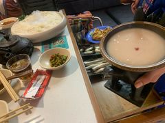 -老牌坊云南鱼豆花火锅(哈西万达店)