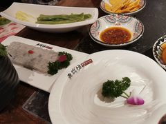 -老牌坊云南鱼豆花火锅(哈西万达店)