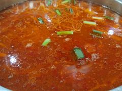 -黄利砖万峰林布依特色酸笋牛肉馆
