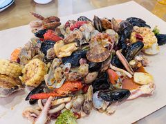 手抓海鲜-桔子海鲜烧烤大排档(金沙滩店)