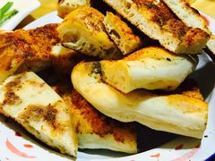 烤馕-老钟家烤羊排·敦伊阁清真餐厅胡羊焖饼