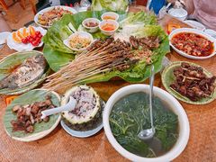 -沐毫傣泐云南菜孔雀宴•手抓饭傣味烧烤(曼听公园店)
