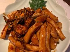 梭子蟹炒年糕-卯时·龙光雅宴·精致锡帮菜(惠山古镇店)
