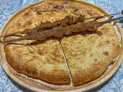新疆土坑烤馕-巴扎美食·新疆菜·西域歌舞表演餐厅(新疆大厦店)