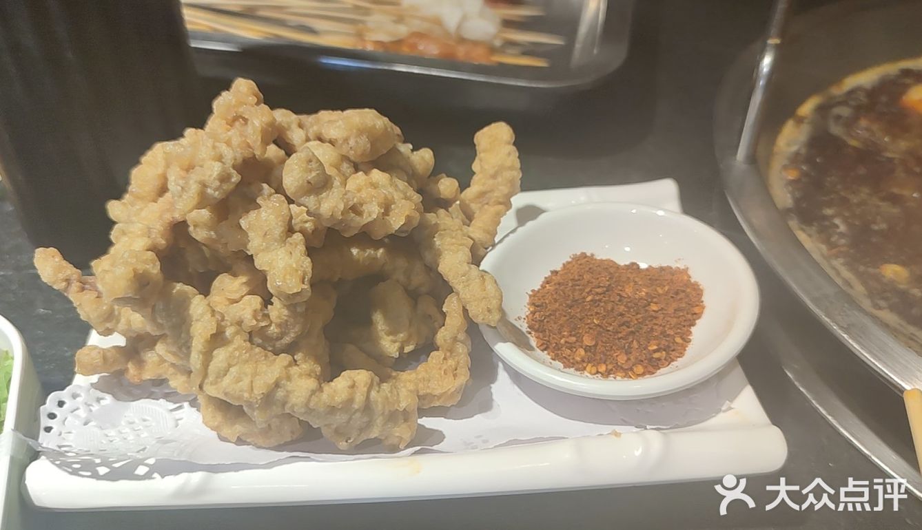 底下全是豆芽，他们家冒菜还是有点辣
