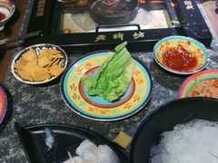 -老牌坊云南鱼豆花火锅(哈西万达店)