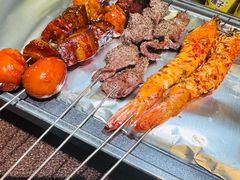 -曼听小寨海鲜烧烤·大连辣炒大王(盖州街店)