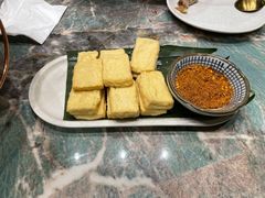 包浆豆腐-浩海火烧云傣家菜(京广店)