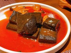 猴头菇鲍汁瑶柱扒制黑豆腐-肴约·花园式餐厅(湖里店)