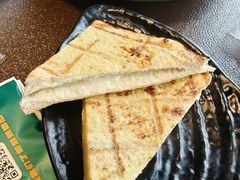 -曼听小寨海鲜烧烤·大连辣炒大王(盖州街店)