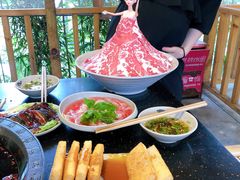 -茅草房·河畔园林火锅