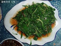 炒马兰头-唔呶喔哩酒家(生产街店)