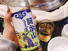 雪花集团的阿尔山啤酒-粘豆包铁锅炖二部(温泉街店)