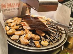 -草家酱蟹炭火烤肉店(珲春南路一店)