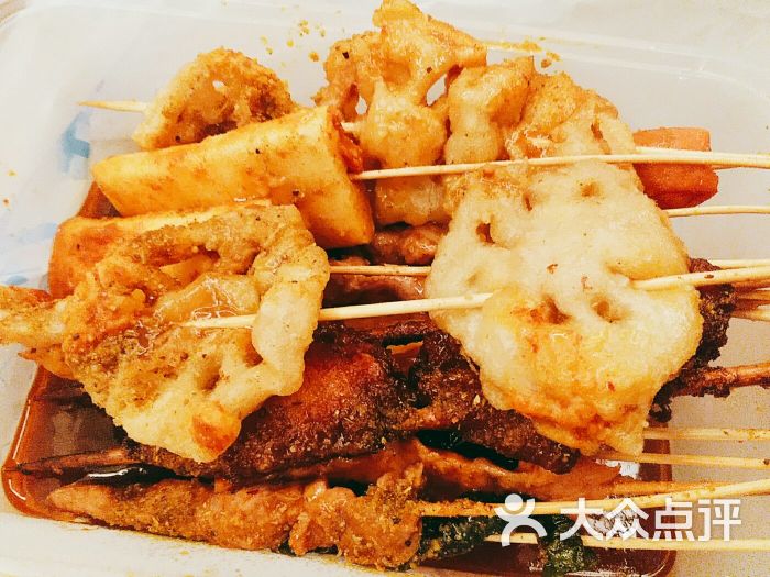 桥下蚝油串图片 - 第1张