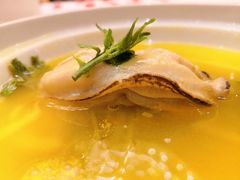 金酸汤生蚝花椒芽-汇贤府·李氏鲁菜(五棵松店)