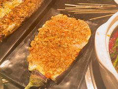 -明何记涮牛肚(品牌首店隋唐植物园南门古城路店)