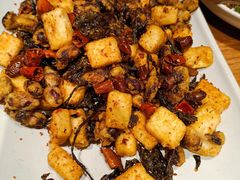 普洱茶炒包浆豆腐-云海肴·汽锅鸡·云南菜(天山百盛优客店)