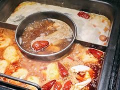 -老牌坊云南鱼豆花火锅(哈西万达店)