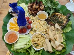 -沐毫傣泐云南菜孔雀宴•手抓饭傣味烧烤(曼听公园店)