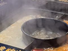 -老牌坊云南鱼豆花火锅(哈西万达店)