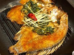 傣族香茅草烤罗非鱼-雀舞云南菜(天津天河城购物中心店)