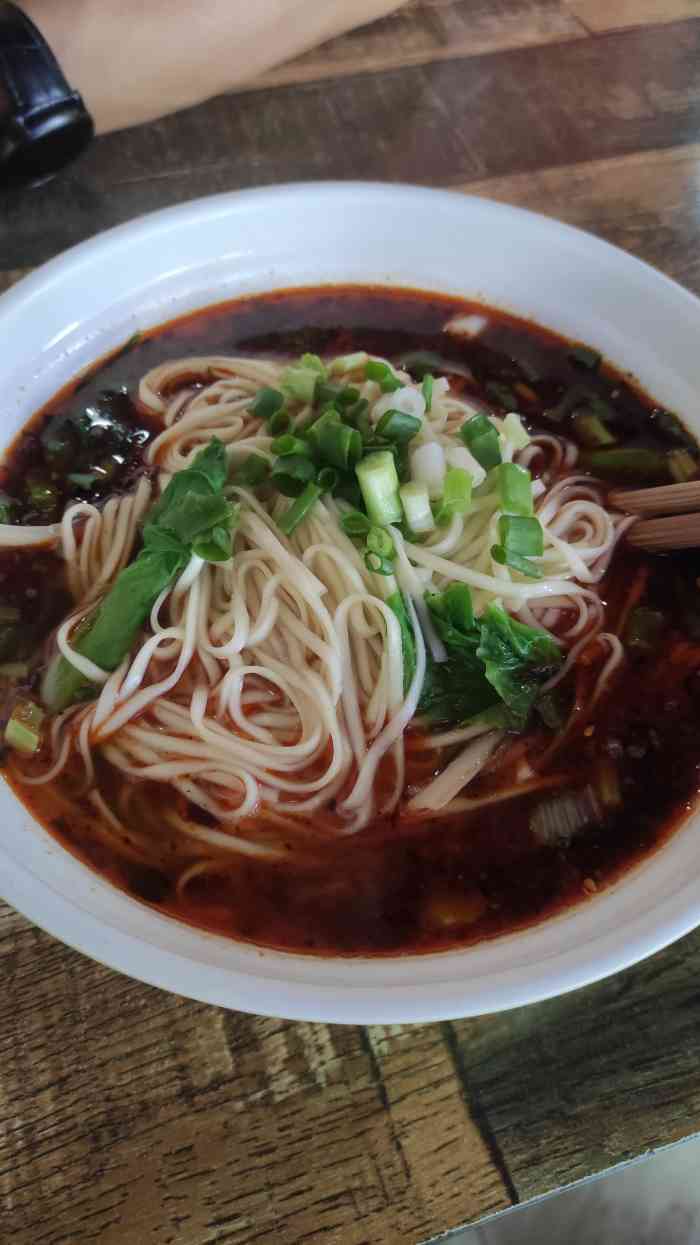 金牌卤肉面-"今天去彭州客户那里去,一大早起床坐车都没.