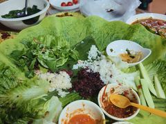 -沐毫傣泐云南菜孔雀宴•手抓饭傣味烧烤(曼听公园店)