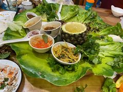 -沐毫傣泐云南菜孔雀宴•手抓饭傣味烧烤(曼听公园店)