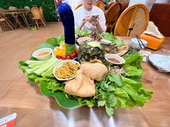 -沐毫傣泐云南菜孔雀宴•手抓饭傣味烧烤(曼听公园店)
