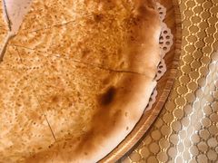 馕坑芝麻馕-巴扎美食·新疆菜·西域歌舞表演餐厅(新疆大厦店)